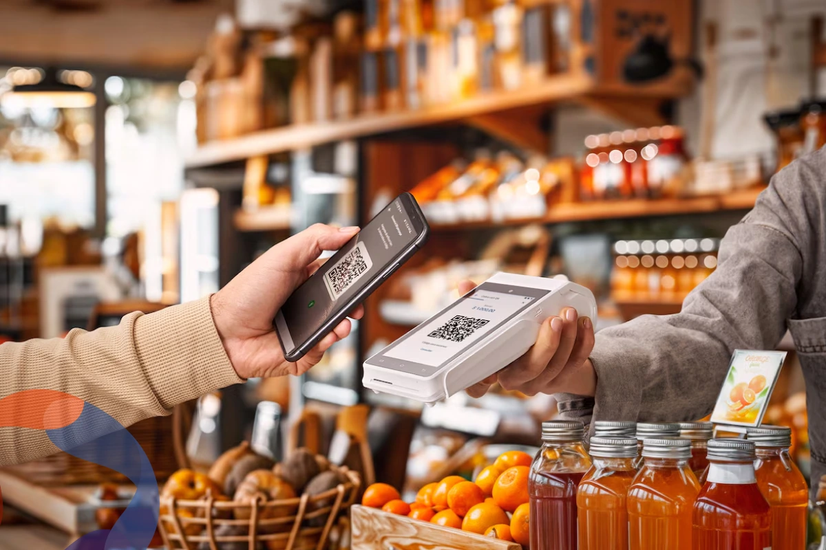 Pago digital con código QR entre cliente y comercio mediante terminal contactless, destacando tecnología segura, rápida y experiencia sin efectivo.